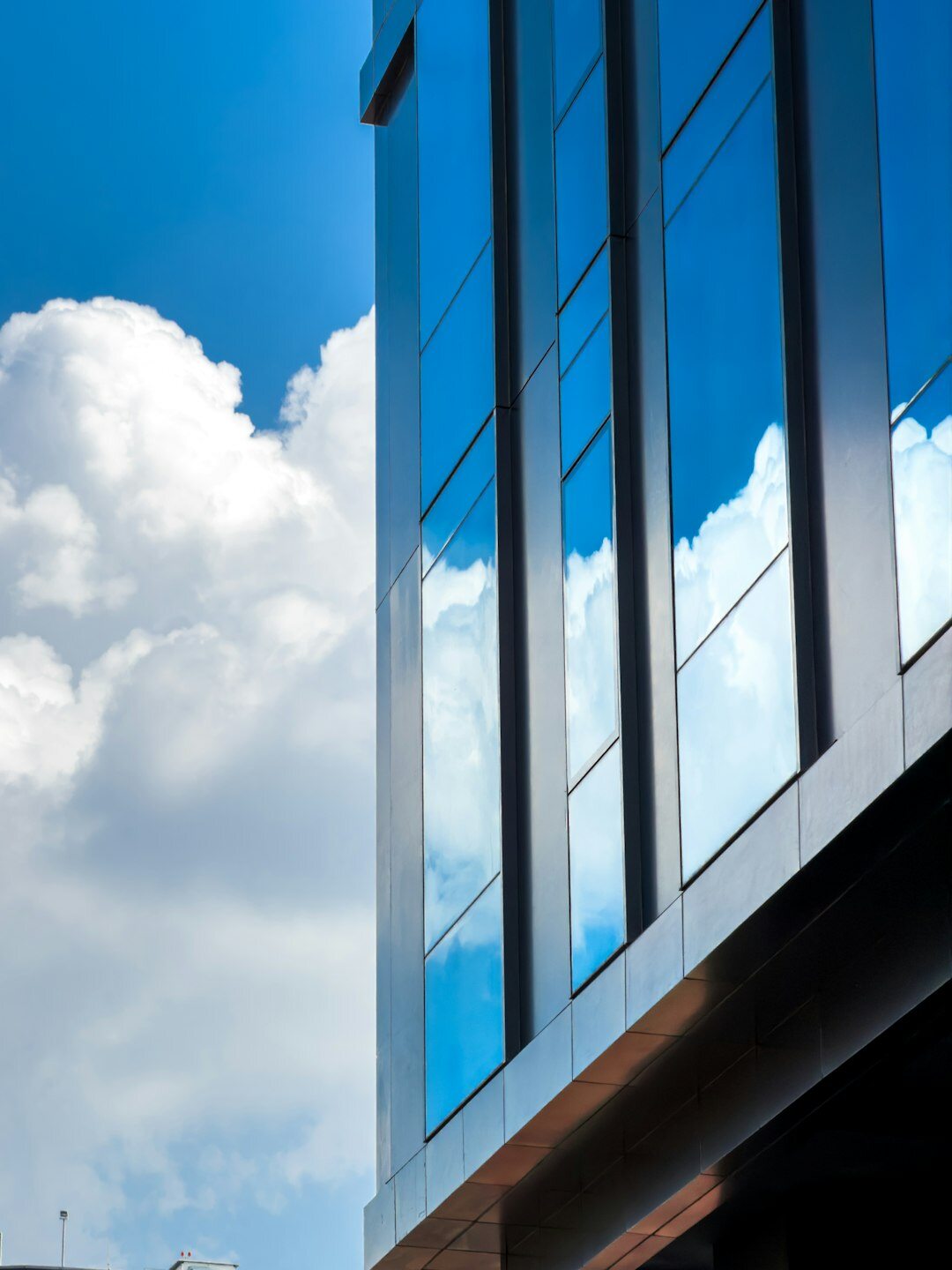 Modern office building exterior with glass facade